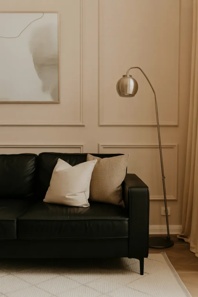 Black Sofa with Neutral Beige Walls