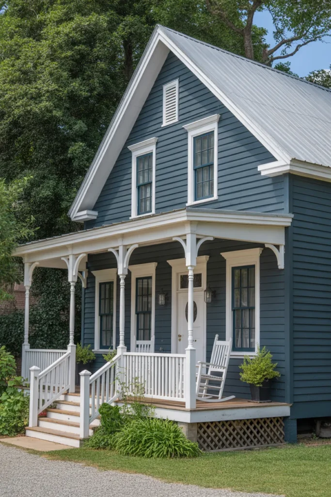 Dark Blue Farmhouse with White Porch