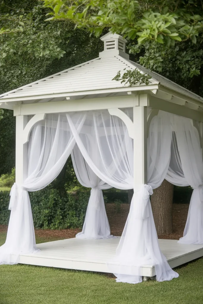 Romantic White Gazebo with Sheer Curtains